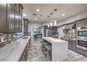 Spacious kitchen with stainless steel appliances, a large island, and stylish countertops at 2232 Barchetta Dr, Las Vegas, NV 89134