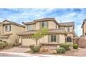 Charming home with a two-car garage and manicured landscaping at 3725 Moonshine Falls Ave, North Las Vegas, NV 89085