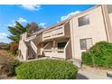 Low angle view of a multi-level building featuring balconies and desert landscaping, blue skies at 3740 Desert Marina Dr # 7, Laughlin, NV 89029