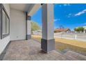 Inviting patio featuring tiled flooring and substantial support columns at 5601 Mary Lou St, Pahrump, NV 89061