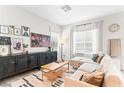 Well-lit living room featuring modern decor, stylish furniture, and an entertainment center at 7350 N Decatur Blvd # 5, Las Vegas, NV 89131