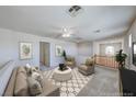 Cozy upstairs room with comfortable seating, neutral decor, and a view of the staircase at 10924 Bandol Pl, Las Vegas, NV 89141