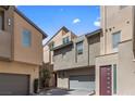 Beautifully designed townhomes offer modern living with private garages and contemporary exteriors at 11357 Gravitation Dr, Las Vegas, NV 89135