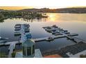Scenic view of boat docks at sunset with lakefront condos in the background at 15 Via Mantova # 104, Henderson, NV 89011