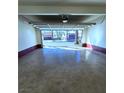 View from garage of neighborhood street with other homes at 3058 Conquista Ct, Las Vegas, NV 89121