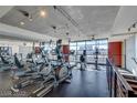 Well-equipped fitness center featuring modern treadmills and elliptical machines with cityscape views at 353 E Bonneville Ave # 369, Las Vegas, NV 89101