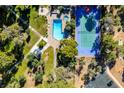 Aerial view of community pool, tennis courts, playground, green spaces, and parking at 730 S Royal Crest Cir # 426, Las Vegas, NV 89169
