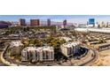 Panoramic aerial view showcasing condos, lush trees, and the dazzling Las Vegas cityscape at 730 S Royal Crest Cir # 426, Las Vegas, NV 89169