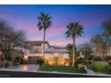 Charming home featuring a well-manicured lawn, elegant landscaping, and a welcoming facade at 11680 Evergreen Creek Ln, Las Vegas, NV 89135