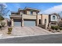 Beautiful two-story home with three-car garage and paved driveway at 11834 Albissola Ave, Las Vegas, NV 89138