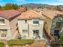 Aerial view of the house, showcasing the backyard, nearby houses and surrounding area at 3023 Sunrise Bay Ave, North Las Vegas, NV 89031