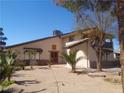 This single Gathering home features unique architectural details and desert landscaping at 3127 Aloha Ave, Las Vegas, NV 89121