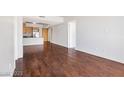 This open living space with sleek hardwood flooring flows nicely into the kitchen and other rooms at 353 E Bonneville Ave # 375, Las Vegas, NV 89101