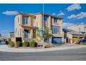 A modern two-story home featuring a neutral color palette, manicured landscaping, and a welcoming entrance at 5946 Ancient Peaks Ave, Las Vegas, NV 89141