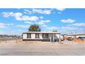 Cozy single-story home featuring a charming front porch and fenced yard, perfect for comfortable living at , Las Vegas, NV 89156