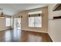 Spacious living room with wood floors, recessed lighting and ample natural light at 2175 Point Mallard Dr, Henderson, NV 89012
