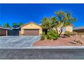 Attractive single-story home with RV parking, desert landscaping, and a large concrete driveway at 3854 E Chaffe Ave, Pahrump, NV 89061