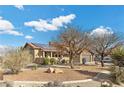 Well-maintained single-Gathering home with desert landscaping and a tile roof at 5690 N Park St, Las Vegas, NV 89149