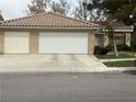 Charming single-story home featuring a two-car garage and well-maintained landscaping at 8154 Flanders Terrace Dr, Las Vegas, NV 89123