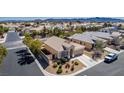 Aerial view of a well-maintained home with a landscaped front yard and community at 8266 Lincoln Valley St, Las Vegas, NV 89123