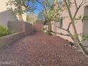 Backyard features include desert landscaping for low maintenance at 1297 Peppercorn Ave, Henderson, NV 89012