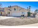 Inviting two-story home with a well-maintained yard and a two-car garage at 139 Serenade Ct, Henderson, NV 89074