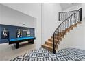 Grand foyer with a staircase and game room featuring a pool table at 1912 Calanda Ct, Las Vegas, NV 89102