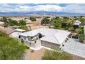 Stunning exterior showcasing a well-maintained home with a light tile roof and mountain views at 3101 Margarita St, Pahrump, NV 89048