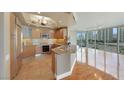 Modern kitchen featuring stainless steel appliances and light wood cabinets at 322 Karen Ave # 708, Las Vegas, NV 89109