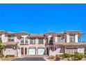 Beautiful townhome features desert landscaping and a unique Mediterranean-style roof at 10 Via Visione # 103, Henderson, NV 89011