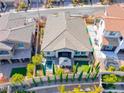 This aerial view showcases a well-maintained home with a private backyard, pool, and charming outdoor pergola at 312 Castellari Dr, Las Vegas, NV 89138