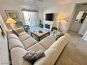 Spacious living area with comfortable seating, electric fireplace, and access to the balcony at 3550 Bay Sands Dr # 3089, Laughlin, NV 89029