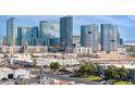 Wide exterior shot of modern high-rise buildings and nearby city blocks at 4471 Dean Martin Dr # 1207, Las Vegas, NV 89103