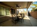 Outdoor patio area with comfortable seating, perfect for relaxing and entertaining at 717 W Colton Ave, North Las Vegas, NV 89032