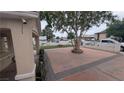 Brick-paved driveway and a well-manicured lawn, enhance curb appeal and provide a warm welcome at 1910 Hoover St, North Las Vegas, NV 89030