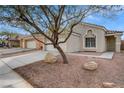 Attractive single-story house with desert landscaping and a well-manicured front yard at 3417 Steppe St, North Las Vegas, NV 89032