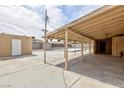 Backyard with a large covered patio and storage shed at 4213 Hayes Pl, Las Vegas, NV 89107