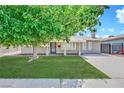 Lovely single-story home with a green lawn at 5376 Hillsboro Ln, Las Vegas, NV 89120