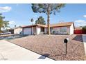 Lovely single-story home with a two-car garage and zero landscaping in a quiet neighborhood at 6325 Miraloma St, Las Vegas, NV 89108