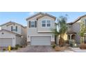 Charming two-story home featuring desert landscaping, a two-car garage, and neutral-toned stucco exterior at 6957 Antequera St, Las Vegas, NV 89149