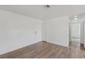 Bright living room with beautiful laminate floors, closet and white walls offers a spacious and versatile living space at 7200 Pirates Cove Rd # 2089, Las Vegas, NV 89145