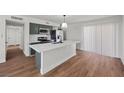 Open kitchen featuring quartz countertops and stainless steel appliances at 728 Carpenter Dr, Las Vegas, NV 89107