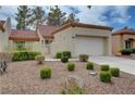 Charming single-Gathering home featuring manicured shrubs and a neatly maintained front yard at 8657 Prairie Hill Dr, Las Vegas, NV 89134