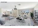 Bright, open living area with new floors, neutral paint, and ample natural light at 3119 Desmond Ave, Las Vegas, NV 89121