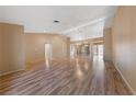 Spacious living room boasting wood floors, high ceilings, and natural light at 9917 Arbuckle Dr, Las Vegas, NV 89134