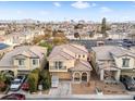 Beautiful aerial view of a two-story home with a tile roof in a well-kept neighborhood at 1309 Rainy Sky Ave, North Las Vegas, NV 89030