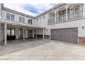 Spacious garage with covered patio, ample parking, and direct access to the house at 2001 Alcova Ridge Dr, Las Vegas, NV 89135