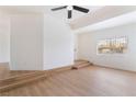 Spacious living room with a ceiling fan, and large window for natural light at 3309 Marionette Ave, Las Vegas, NV 89101