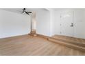 Bright living room featuring new floors and a stylish ceiling fan at 3309 Marionette Ave, Las Vegas, NV 89101