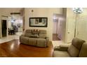 Cozy living room featuring comfortable seating and tile flooring creates a relaxing atmosphere at 533 Calypso Dr, Henderson, NV 89002